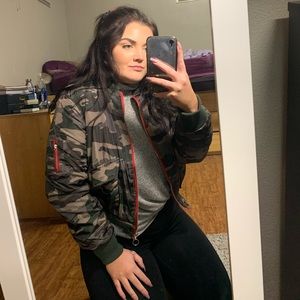 Camo puffer jacket with red accents